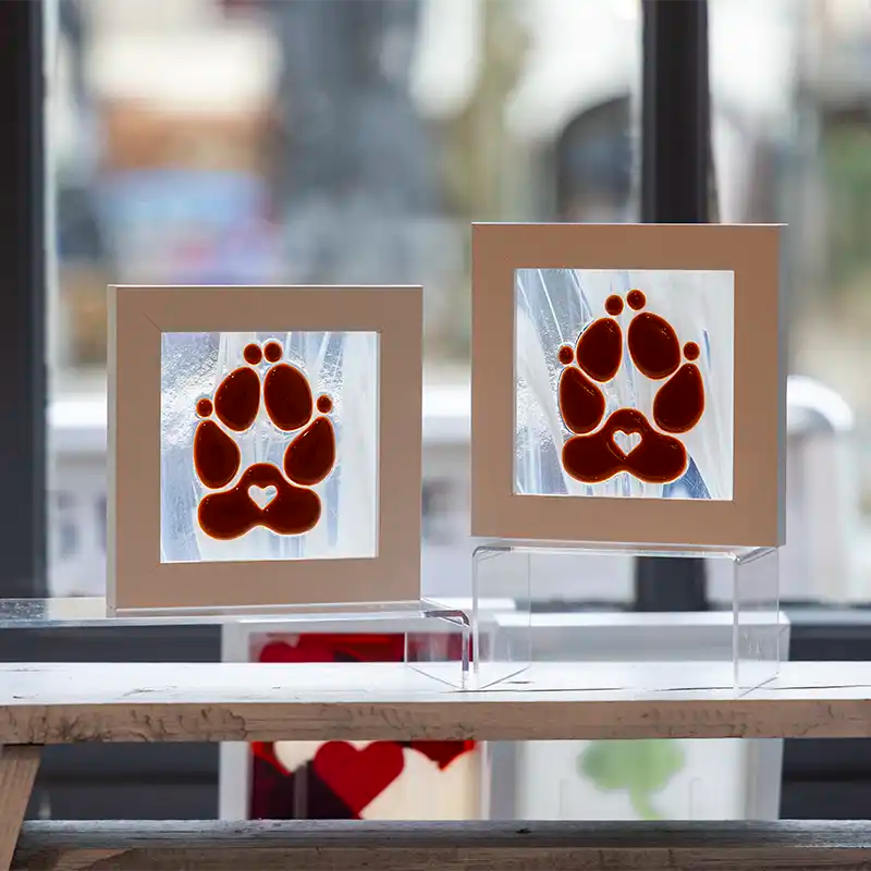 paw print of your beloved four-legged friend in glass