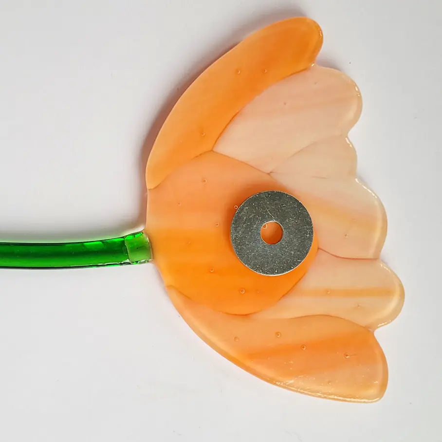 Washers are glued to the back of the flower